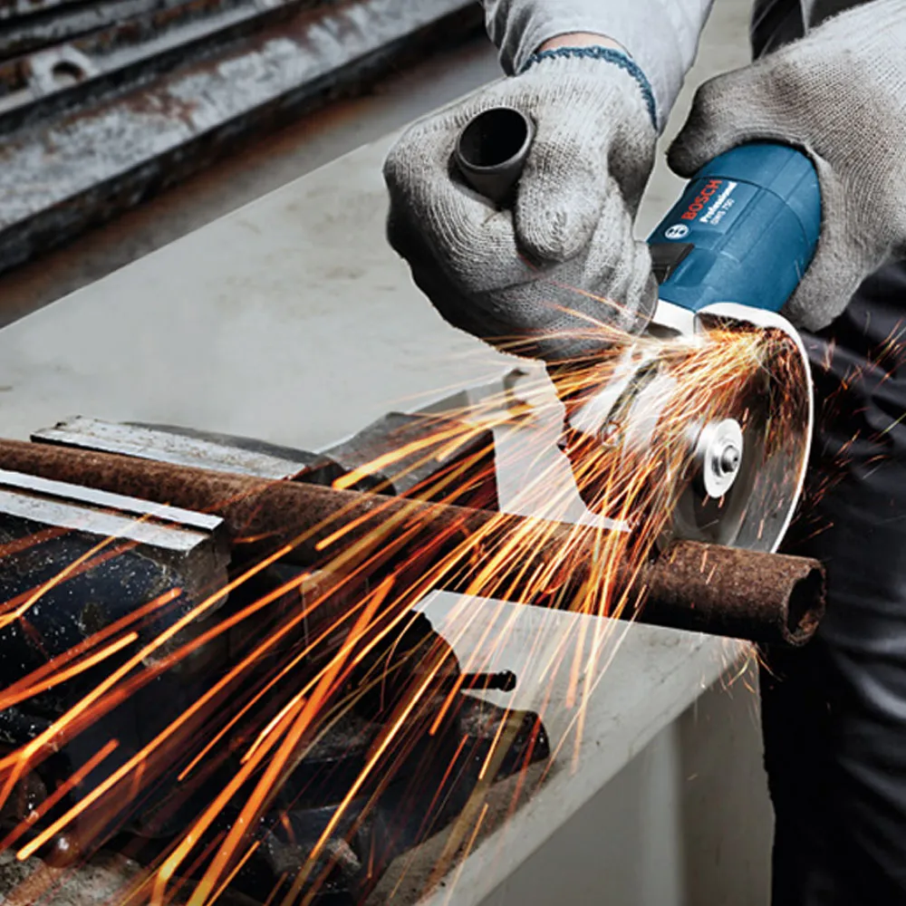 4 1/2 grinder being used to cut a pipe whilst on a training course